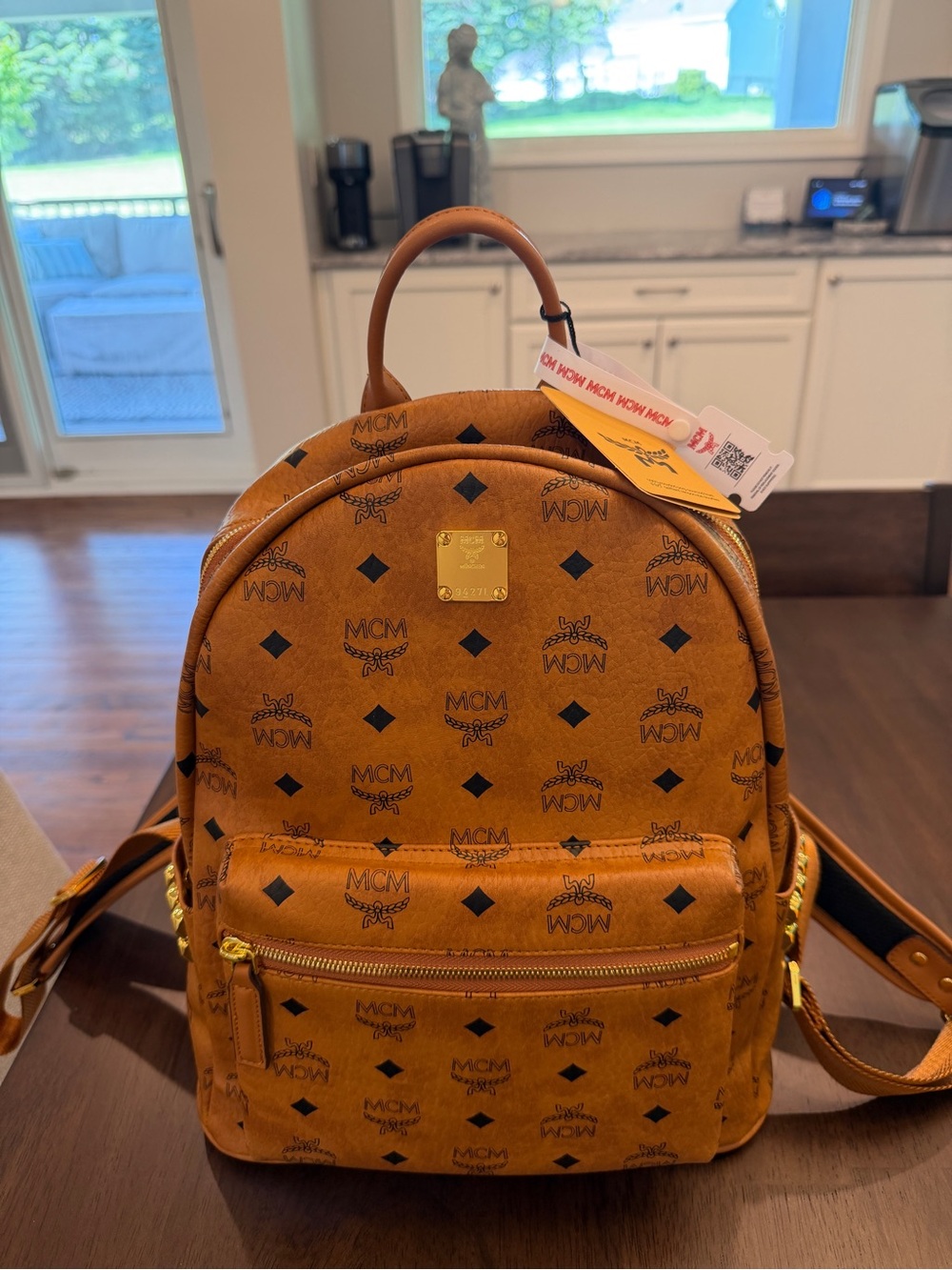 MCM Cognac Brown Logo-Print Backpack with Gold Plaque